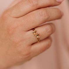 Shimmering wings, delicately perched on your finger 🦋 our graceful Tiny Butterfly Ring is sustainably handcrafted to order order, right here in our little studio! Check out the entire Butterfly Collection here: https://www.etsy.com/shop/NOLIAjewelry?ref=mini_mfts_name&listing_id=740161864&search_query=butterfly And the larger version of this ring here: https://www.etsy.com/listing/1509709282/butterfly-ring-gold-silver-or-rose-gold DETAILS  * Available in 14k Gold Filled, 14k Rose Gold Filled, Sterling Silver, Solid 14k Yellow Gold or Solid 14k Rose Gold. * The band is smooth and is approximately 1.4mm.  * The butterfly measures 5mm across. * Each ring sold separately. Handcrafted to order in our Salt Lake City studio ✨ . . . . . . . . . . . . . . . . . . . . . A B O U T * U S * A N D * O Birthday For Mom, Feminine Minimalist, Tiny Butterfly, Gold Stacking Ring, Butterfly Collection, Mom Friend, Minimalist Gifts, Gift For Her Birthday, Butterfly Ring