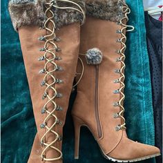 Never Worn Light Brown, Faux Fur Detailed, Faux Suede, High Heeled Fall/Winter Boots. Inside Leg Zipper With Front Lacing. Laces Have Faux Fur Pom On Ends. Laid Flat On Side, Calf Approximately 8 In Across. Length From Heel (One’s Heel Inside Boot) To Top Of Boot - 17 Inches 4 1/2 In. Heel Has Something Stuck On One Heel (See Picture). Can Be Scraped Off, But Leaving It To You! Fall Winter Boots, High Heeled Boots, Just Fab Shoes, Winter Shoes, Fit Mom, High Heel Boots, Shoes Heels Boots, Winter Boots, Faux Suede