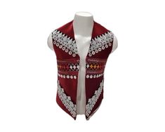 ~ Step into the cultural beauty of Afghanistan with our Afghan Traditional Velvet Waistcoat.  Created by Afghan women, each waistcoat is made with care, featuring a beautiful maroon velvet and a unique patchwork design that shows off Central Asian traditions.  This waistcoat is for everyone, adding a touch of tribal patterns and boho style to any occasion. Wear this handmade treasure to celebrate Afghan culture and show your authentic style!  PLEASE NOTE: Each waistcoat is 100% customized and ta Traditional Sleeveless Vest For Festive Occasions, Traditional Sleeveless Festive Vest, Red Embroidered Sleeveless Vest, Traditional Sleeveless Vest Outerwear, Traditional Red Vest For Festival, Traditional Embroidered Sleeveless Outerwear, Folk Style Sleeveless Vest For Festive Occasions, Traditional Sleeveless Vest For Festivals, Folk Style Festive Sleeveless Vest