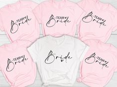 six bridesmaid shirts in pink and white with the words teamy bride on them