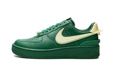 The Ambush x Nike Air Force 1 Low “Green” is a collaboration by Yoon Ahn and Verbal’s luxury jewelry brand that puts a premium spin on the retro basketball shoe.  Simply dubbed the “Green” colorway, Ambush’s take updates the Air Force 1 Low with mostly monochromatic green appearance.  The shoe’s upper features a green leather construction.  A Citron-colored elongated Swoosh is found on either side and extends off the heel.  A TPU heel overlay ties into the shoe’s contemporary vibe.  A co-branded Ambush Air Force, Nike Ambush, Nike X Ambush, Yoon Ahn, Jordan 1 Mids, Nike Set, Sneakers Box, Low Air Jordan 1, Air Force 1s