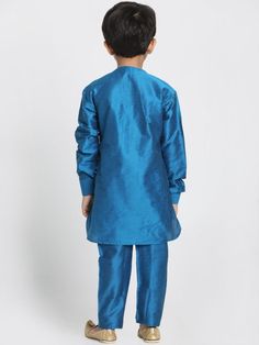 JBN CREATION Boys' Light Blue Cotton Silk Blend Kurta and Pyjama Set Dress your little man in comfort and style with this light blue kurta pyjama set from JBN Creation. The cotton silk blend fabric is soft and breathable, perfect for keeping him cool all day long. The classic design features a kurta with a mandarin collar and long sleeves, paired with comfortable pyjama pants. Key Features Light blue cotton silk blend fabric for comfort and breathability Classic kurta design with mandarin collar Pyjama Pants, Blue Kurta, Kurta Pyjama, Kurta Design, Comfortable Pajamas, Pajama Pant, Kurta Designs, Feature Light, Pyjama Set