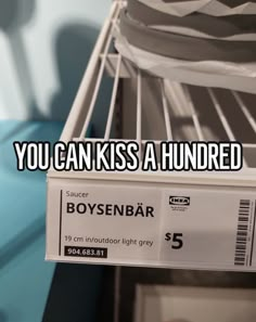 a box that is inside of a refrigerator with the words you can kiss a hundred dollars