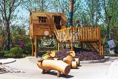 children's play area with wooden furniture and trees