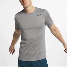 Brand New!! Never Worn!! The Nike Dri-Fit Legend T-Shirt Is An Essential Layer With An Odor-Resistant Finish That Helps Keep You Fresh Through Workouts At Any Level. Lightweight Fabric Breathes And Wicks Sweat So You Stay Cool And Dry From Warmups Well Into The Afterburn. Nike Tri-blend Sports T-shirt, Nike Tri-blend Tops For Sports, Nike Tri-blend Sports Top, Nike Relaxed Fit T-shirt For Gym, Nike Sports Tops In Tri-blend, Nike Short Sleeve T-shirt For Gym, Athletic Heather Workout T-shirt, Fitted Gray Moisture-wicking T-shirt, Athletic Heather Workout Tops With Short Sleeves