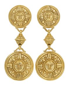 These elegant and whimsical dangle earrings feature a heliocentric motif. The lustrous 18K gold earrings feature two disks embellished with radiant suns. The earrings carry the signature chic point-of-view of luxury goods and jewelry brand Kieselstein-Cord. Founded by American designer, artist and photographer Barry Kieselstein-Cord in 1972 in Manhattan, New York, Kieselstein-Cord has remained a fashionable tastemaker crafting jewelry, belt buckles, bronze statuary, leather goods, eyewear, home furnishings and accessories. Set in 18K gold. 2 7/8" length Gold Sun Earrings, Jewelry Belt, Darker Skin Tones, Skin Undertones, Sun Earrings, Crafting Jewelry, 18k Gold Earrings, Gold Sun, Yellow Gold Jewelry