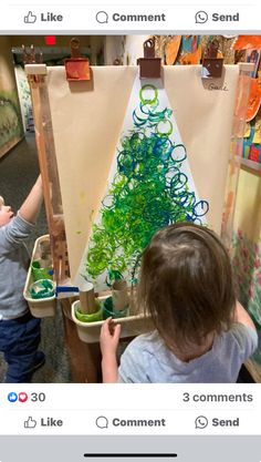 two young children painting on canvases in an art room with the caption, i like comment