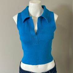 Caroline Constas Luxe Ribbed Knit Crop Tank Can Be Casual With Jeans Or Dressed Up With A Maxi Skirt. Beautiful Crochet Trim. Size: Medium Color: Vibrant Blue New With Tags. No Flaws. Details: - Stretch Fabric - Sleeveless Design - V-Neck With Crochet Collar - Machine Washable Contents: 70% Rayon, 30% Nylon Fast Shipping - Ships Same Day Or Next Day!! Thanks For Supporting My Small Business! Casual Blue Knitted Top, Blue Fitted V-neck Knit Top, Trendy Fitted Textured Knit Sweater Vest, Fitted Blue V-neck Knit Top, Blue Sleeveless Knit Top, Blue Trendy Knitted Tops, Trendy Blue Knitted Tops, Fitted Blue Knit Top, Blue V-neck Knitted Top