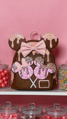 Add some sweetness to your 'fit with our exclusive #MinnieMouse chocolate lollipop mini backpack from Loungefly 🍭  🍫  | Shop Mouse Chocolate, Lollipop Design, Disney Bags Backpacks, Japanese Handbag, Chocolate Lollipop, Disney Ears Headband, School Suplies, Sanrio Bag, Loungefly Backpack