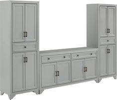 a white cabinet with drawers and cupboards next to each other on a white background