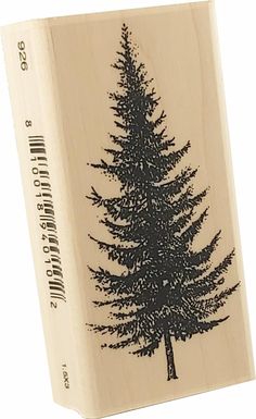 a rubber stamp with a pine tree on it