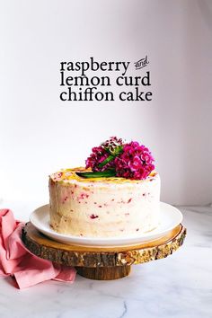 a cake with raspberry and lemon curd chiffon cake on top