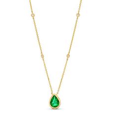 This Pear Shape Green Emerald Necklace is a stunning shade of green, complemented by brilliant round diamonds set in bezels evenly spaced along a delicate 14K yellow gold chain. Green Emerald Necklace, Diamonds Direct, Round Diamond Setting, Emerald Necklace, Diamond Education, Yellow Gold Chain, Pear Diamond, Fine Jewelry Designers, Green Emerald