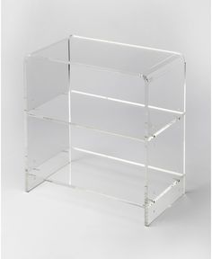 three tiered clear acrylic display case on white background with clipping for text