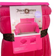 pink bedding set with black lace trims on the bottom and sides in an open box