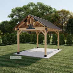 a gazebo in the middle of a grassy area with trees and bushes behind it