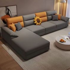 a living room filled with furniture and a large sunflower pillow on the back of the couch