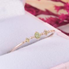 Unique peridot promise ring for her, Small & Dainty rose gold womens peridot ring, Simple 3 stone promise ring, Delicate promise ring WE OFFER UNLIMITED PERIOD INSTALLMENTS PLAN This is a beautiful, stunning, feminine ring that works well for all occasions, styles, and ages. You will love it! Ring information: Stones: Peridot Approximate size: 2.5mm (1 stone) Approximate size: 1.5mm (2 stones) Metal type: Gold Metal stamp: 14k Gold Installment Payments We offer installment payments for an un Promise Rings Peridot, Women’s Promise Rings, Hippie Promise Rings, Peridot Promise Ring, Colorful Promise Rings, Crystal Promise Rings, Aesthetic Promise Rings Gold, Dainty Green Ring, Small Promise Rings