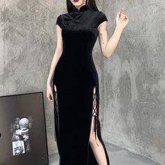 Introducing our Gothic Velvet Slit Cheongsam Dress, designed to turn heads and leave a lasting impression. This dress boasts an empire waistline and a mid-calf length, creating a sophisticated and elegant look. The dress features a unique lace-up crisscross design on both sides, adding a touch of edginess to the overall design. The thigh-high slit hem is perfect for showing off your legs and adding a touch of glamour to your look. Luxurious velvet fabric Empire waistline for a flattering silhoue Short Pattern, Aesthetic Dress, 파티 드레스, Party Kleidung, Goth Dress, Cheongsam Dress, Vintage Material, Gothic Dress, Vintage Elegant