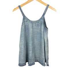 Anthropologie Pilcro Chambray Swing Blouse Color: Denim Light Sleeveless, Tank Top, Swing Silhouette, Pullover Styling, Rear Button Detail, Frayed Hem Sweep. Lightweight 63% Cotton, 37% Lyocell Chambray Fabric. Machine Wash. Condition: New With Tag. Never Worn. Smoke Free. Size: X-Small Measurements (Flat): Underarm To Underarm - 17" Hem Sweep - 28" Length (Front/Center - Neckline To Hem) - 19" I Recommend Doing An Online Search To Read Anthropologie Purchaser Reviews About A Garment’s Sizing An Casual Denim Blue Vest Top, Casual Medium Wash Denim Tank Top, Sleeveless Denim Blue Vest Top, Denim Blue Vest Top For Spring, Casual Sleeveless Denim Vest Top, Medium Wash Vest Top For Spring, Casual Blue Denim Tank Top, Casual Tank Top Vest, Sleeveless Denim Tank Top For Spring