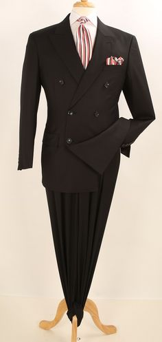 <p>Apollo King Men's 2pc Double Breasted Suit - Double Pleated Pants. <br/><br/> Standard Length <br/> 6 Button Jacket <br/> Double Breasted <br/> Peak Lapel <br/> Besom Pocket <br/> Flap Pockets <br/> Side Vents <br/> Double Pleated Pants<br/> Poly-Rayon Blend<br/> Pants Lined to the Knee <br/> Dry Clean Only <br/> Imported <br/><br/> All sizes displayed are jacket sizes. All suits come with pan Red Overcoat, Black And Red Suit, Black Pinstripe Suit, Grey Pinstripe Suit, Homecoming Suits, Sharkskin Suit, Grey Overcoat, Graduation Suits, Charcoal Gray Suit