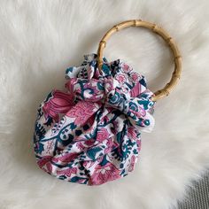 Furoshiki Bag with Bamboo Handles. The bag is made with a piece of double sided hand block printed cotton (one side is plain ) with a set of bamboo handles. Cute round shaped Furoshiki bag is durable and versatile, comes with a shape support bag-in-bag. Dimensions of the bag is 8" (20CM) wide, 7" (18CM) height, bottom depth 1.5" (4CM) Furoshiki dimensions : 28" x 28" (70CM x 70CM) 100% cotton for the fabric part 100% Bamboo for the handles CARE· Only the fabric part can be washed in machine if u Daily Use Handheld Bucket Bag With Bamboo Handle, Daily Handheld Bucket Bag With Bamboo Handle, Gift Bamboo Handle Handheld Shoulder Bag, Handheld Shoulder Bag With Bamboo Handle As Gift, Gift Handheld Shoulder Bag With Bamboo Handle, Eco-friendly Bag With Bamboo Circular Handle, Pink Bag With Bamboo Handle For Everyday Use, Pink Everyday Bag With Bamboo Handle, Bohemian Bucket Bag With Bamboo Handle For Daily Use