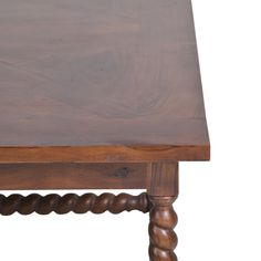 an old wooden table with turned legs and wood grain on the top, isolated against a white background