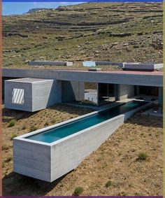 a house with a pool in the middle of it