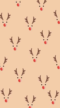 a christmas pattern with reindeer's noses and red balls on the nose is shown