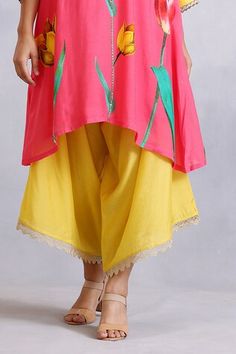 Pink kurta with floral pattern, highlighted with sequin and lace embroidery. Paired with a yellow draped pant. - Aza Fashions Yellow Drapes, Asymmetric Kurta, Pink Kurta, Drape Pants, Lace Embroidery, Pant Set, Pink Cotton, Set For Women, Cotton Silk