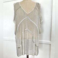 Parker Size M Cold Shoulder Beaded Blouse Nwt. Blouse Is Beautiful With So Much Beading Detail. Has Some Minor Loose Threads But Not Very Noticeable. Please See All Photos. This Would Be The Perfect Top To Wear For The Holidays! Glamorous Party Tops With Beaded Fringe, Glamorous Beaded Fringe Top For Party, Summer V-neck Beaded Top, Beaded Short Sleeve Top For Party, Beaded V-neck Tops For Summer, Summer Beaded V-neck Tops, White Sequined Blouse For Night Out, Glamorous Embellished V-neck Tops, Glamorous White Summer Blouse