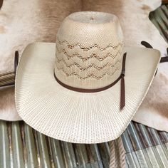 Twister ivory bangora vented straw hat. Cool hand luke crown shape. Medium width crease slightly pulled down in the front. Quality mesh fabric interior band. Designed for wear by women or men, fashion or function. Rugged and durable. Ivory and natural with a 2 cord chocolate hat band. 5 1/2" crown and 4 1/2" brim. Cheap Americana Hat With Curved Brim, Affordable Adjustable Cowboy Hat With Curved Brim, Cheap Short Brim Cowboy Hat For Ranch, Cheap Brimmed Cowboy Hat For Outdoor, Cheap Brimmed Mini Hats For Rodeo, Cheap Adjustable Western Cowboy Hat, Cheap Adjustable Cowboy Hat For Summer, Cheap Country Style Brimmed Hats, Cheap Casual Cowboy Hat With Curved Brim