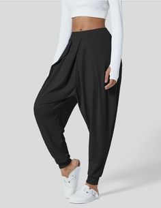 Mid rise with pockets in size XL Price: $40 Baggy Solid Color Athleisure Activewear, Sporty Stretch Harem Pants, Solid Color Baggy Athleisure Activewear, Athleisure Stretch Bottoms With Cuffed Ankles, Sporty Stretch Harem Pants For Yoga, Black Ankle-length Yoga Activewear Pants, Black Ankle-length Yoga Activewear, Athleisure Stretch Pants With Cuffed Ankles, Sporty Harem Yoga Pants With Elastic Waistband