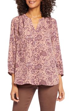 This lightweight crepe blouse has a roomy fit and relaxed high-low hem and comes in a closetful of lively colors and prints. 25 1/2" regular length (size Medium) 24" petite front length (size Medium P) Hidden-button placket Split neck Band collar Three-quarter sleeves High-low hem 100% polyester or 70% recycled polyester, 30% polyester Dry clean or machine wash, tumble dry Imported Women's Clothing | NYDJ High/Low Crepe Blouse Pink Relaxed Fit Blouse For Fall, Relaxed Fit Pink Blouse For Fall, Fall Printed Split Neck Blouse, Printed Long Sleeve Tops For Daywear, Stretch V-neck Blouse For Daywear, Pink Relaxed Fit Top With 3/4 Sleeves, Casual Pink Blouse With Split Neck, Relaxed Fit Printed Tops, Relaxed Fit Printed Tops For Daywear