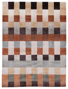 an area rug with different colored squares on it