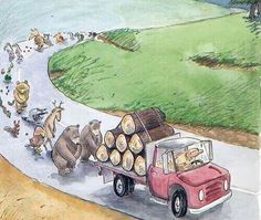 a car with logs in the back driving down a road next to an elephant and other animals