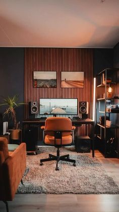 a living room filled with furniture and a flat screen tv sitting on top of a wall