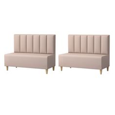 two beige chairs sitting next to each other