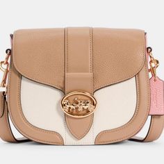 Product Details Light Pink/Cream/Ivory And Gold Accents Refined Pebble Leather And Smooth Leatherinside Multifunction Pocketssnap Closure, Fabric Liningoutside Open Pocketdetachable Strap With 20 3/4" Drop For Shoulder Or Crossbody Wear 8 1/4" (L) X 6 3/4" (H) X 2 3/4" (W) Mint, Rare, Nwt With Wrappings, Still In Plastic, Smoke Free Home Chic Beige Saddle Bag, Beige Saddle Bag With Removable Pouch, Designer Cream Crossbody Shoulder Bag, Coach Cream Bags With Removable Pouch, Coach Bags With Removable Pouch In Cream, Beige Saddle Bag Satchel With Removable Pouch, Beige Tote Saddle Bag With Detachable Strap, Designer Cream Bags With Adjustable Strap, Coach Cream Bag With Detachable Handle