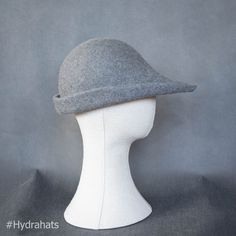 Medieval bycocket hat is made of rabbit hair felt. Colour gray. Size 59-60 cm/ 23.2 - 23.6  inches (drop like shape is a bit universal). Spiky surface thanks to hare hair content. Hat inspired by picture from  1407 Terence, Comoediae, Andria (Paris). For production I used technique of steaming and shrinking on the wooden form (milinery hat block). No lining insied of the hat. If in doubt regarding colour, let me know, I can send you sample of material. Be aware that colours may look diefferent depending on your screen settings. Nice accessory to all 15th century middle age and renascence reenactment costumes.  Environmental friendly postal packaging - hats are packed with help of paper stuffing in cardboard boxes, sealed by paper tape. If possible, I reuse packaging from my own purchases t Gray Felt Hat For Winter, Gray Fitted Felt Hat For Winter, Fitted Gray Wool Hat, Fitted Gray Felt Hat With Curved Brim, Fitted Gray Brimmed Felt Hat, Gray Fitted Felt Hat With Curved Brim, Medieval Hats, Hair Content, Colour Gray