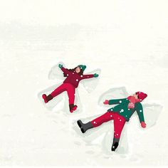 two people in red and green snowsuits are laying on the snow covered ground