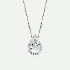 Our Riva necklace is crafted in 9ct solid white gold and adorned with a total of 1.05 carats of ethically sourced lab-grown diamonds. At the heart of the pendant shines a captivating 1 carat pear-shaped diamond, radiating brilliance and charm. Whether worn as a standalone statement piece or paired with the matching Riva Earrings, this pendant is sure to make a lasting impression. Length of chain 18 inches. All lab grown diamonds on this piece are hand-selected and have a colour and clarity of F- Pear Shaped Diamond, Pear Cut, 1 Carat, Pear Shaped, Statement Pieces, Lab Grown, Lab Grown Diamonds, Diamond Necklace, Pear