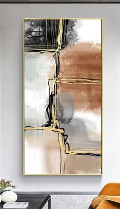 an abstract painting hangs on the wall next to a chair and coffee table in a modern living room