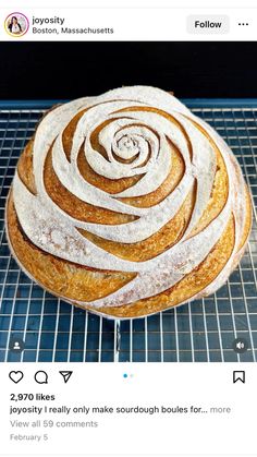 a loaf of bread sitting on top of a cooling rack