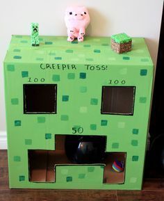 a cardboard box with a pig on top of it