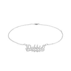 She is certain to admire the details of this personalized heart anklet. Fashioned in sterling silver, this 0.5-inch design showcases a name or word of your choice - up to eight characters in length - in a sculpted script font. A pair of hearts centered between ribbon-shaped accents completes the look. Buffed to a brilliant luster, this 9.5-inch rolo chain anklet with an additional closure ring at 9.0 inches secures with a lobster claw. Silver Heart Name Bracelet, Heart Ribbon, Heart Anklet, Font A, Discount Jewelry, Double Heart, Chain Anklet, Rolo Chain, Script Font