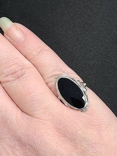 stars Formal Oval Onyx Jewelry, Formal Oval Onyx Rings, Black Oval Jewelry With Bezel Setting, Oval Onyx Jewelry For Anniversary, Oval Onyx Rings For Anniversary, Fine Jewelry Oval Onyx Ring, Fine Jewelry Onyx Oval Ring, Oval Onyx Fine Jewelry, Oval Onyx Ring With Cabochon