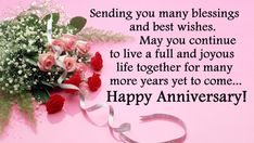 a bouquet of roses sitting on top of a pink background with the words happy anniversary