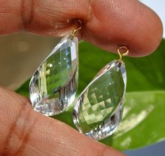 1 Pair 24x12mm AAA Rock Crystal Quartz Faceted Twisted Drop Briolettes / Gemstone Pendant / Earrings Findings / DIY Jewelry Making / Finding. Gemstone: AAA Rock Crystal Quartz  Dangle Size: 29x12mm with loop Stone Size: 24x12mm Quantity: 1 Pair To check more of dangle briolette, please visit:- https://www.etsy.com/shop/RareGemsNJewels/search?search_query=dangle+briolette&order=date_desc&view_type=list&ref=shop_search Contact us for bulk wholesale orders for our items as we stock a huge volume of most items in our shop. Email us for wholesale pricing details. To check more of our seven chakra pendant visit the link given below:- https://www.etsy.com/in-en/shop/RareGemsNJewels/search?search_query=flat+pencil+pendant&order=date_desc&view_type=list&ref=shop_search To check more of our Gold / S Carnelian Jewelry, Chakra Pendant, Crystal Wand, Cute Necklace, Crystal Quartz, Earring Findings, Rock Crystal, Pendant Earrings, Diy Jewelry Making