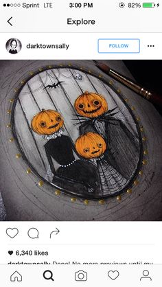 a drawing of three jack - o'- lantern pumpkins in a round frame